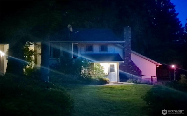 5363 Reese Hill Rd, Sumas, WA 98295 - back of house at twilight with a chimney and a yard