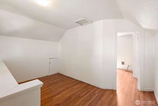 12 Fairgrounds Rd, Skamokawa, WA 98647 - bonus room featuring lofted ceiling, light wood finished floors, and attic access