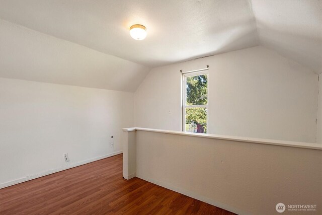12 Fairgrounds Rd, Skamokawa, WA 98647 - bonus room featuring vaulted ceiling, wood finished floors, and baseboards
