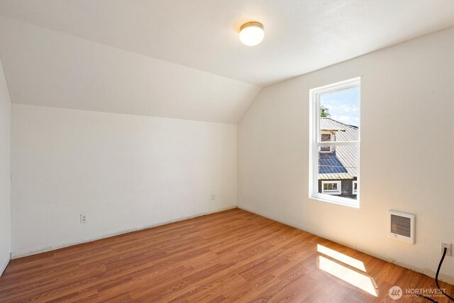 12 Fairgrounds Rd, Skamokawa, WA 98647 - bonus room featuring vaulted ceiling, wood finished floors, and heating unit