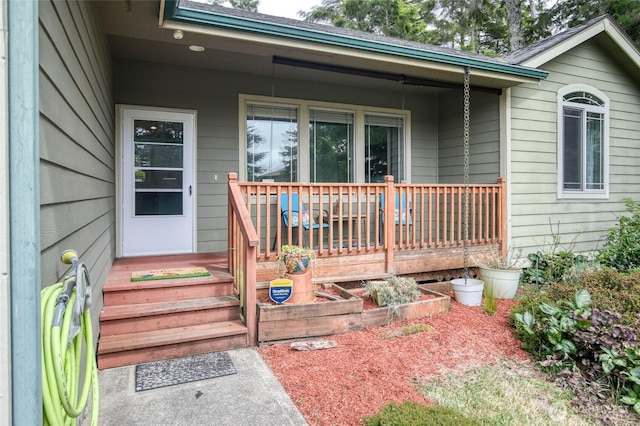 566 Duck Lake Dr SE, Ocean Shores, WA 98569 - doorway to property with covered porch