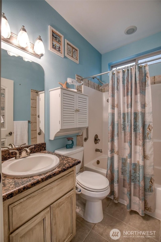 566 Duck Lake Dr SE, Ocean Shores, WA 98569 - bathroom with shower / bath combo, vanity, tile patterned floors, and toilet