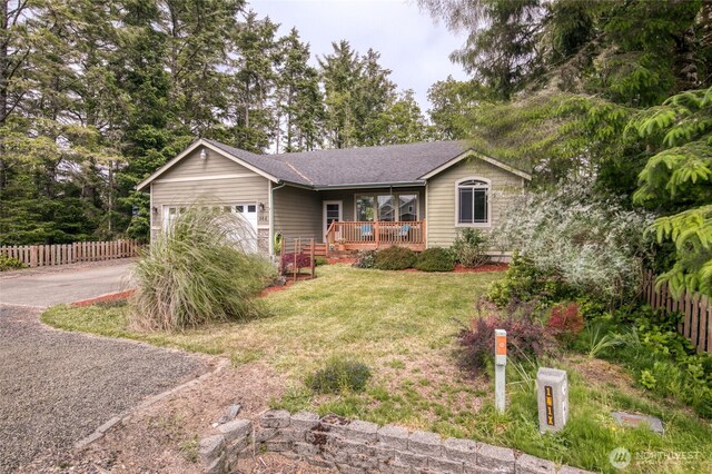 566 Duck Lake Dr SE, Ocean Shores, WA 98569 - single story home with an attached garage, driveway, a shingled roof, and a deck