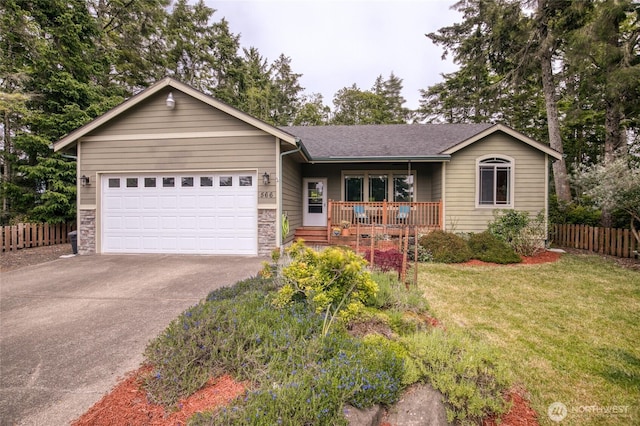 566 Duck Lake Dr SE, Ocean Shores, WA 98569 - ranch-style home with covered porch, driveway, a garage, a shingled roof, and stone siding
