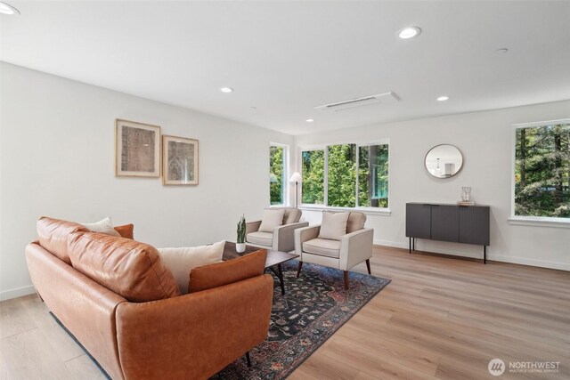 20313B 14th Ave NE, Shoreline, WA 98155 - living area featuring light wood finished floors, recessed lighting, and baseboards