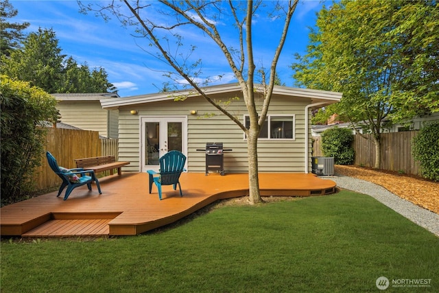 3907 SW 102nd St, Seattle, WA 98146 - rear view of property with french doors, a wooden deck, and central AC unit