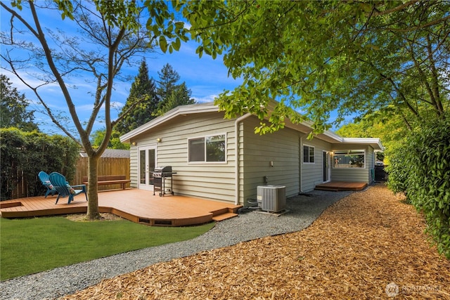 3907 SW 102nd St, Seattle, WA 98146 - rear view of house featuring central AC and a deck