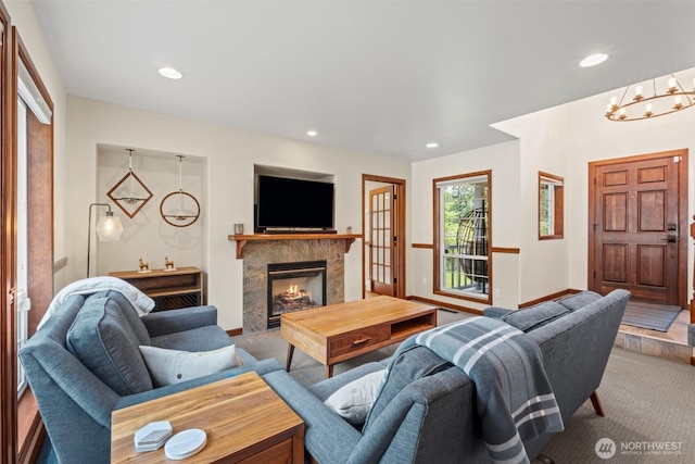 12606 Icicle Ln, Leavenworth, WA 98826 - living room featuring carpet, recessed lighting, a chandelier, and a premium fireplace