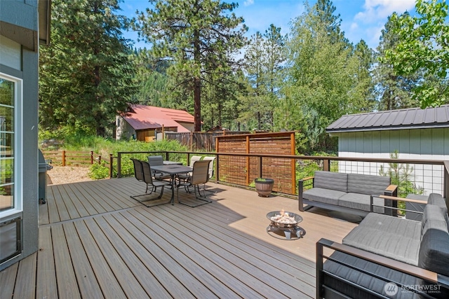12606 Icicle Ln, Leavenworth, WA 98826 - wooden terrace with an outdoor living space with a fire pit and outdoor dining area