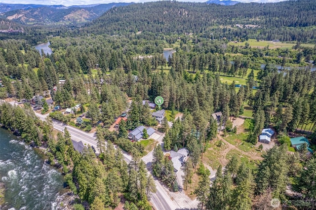12606 Icicle Ln, Leavenworth, WA 98826 - aerial view of property's location with a heavily wooded area and a water and mountain view