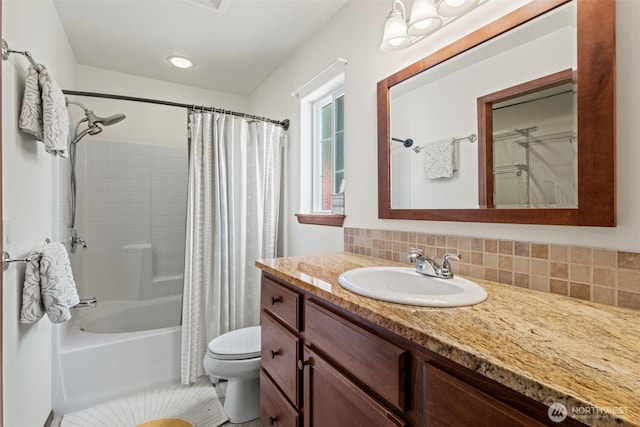 12606 Icicle Ln, Leavenworth, WA 98826 - full bathroom with vanity, shower / tub combo, toilet, and decorative backsplash