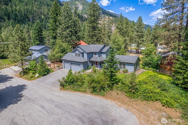 12606 Icicle Ln, Leavenworth, WA 98826 - aerial view of property and surrounding area featuring a heavily wooded area