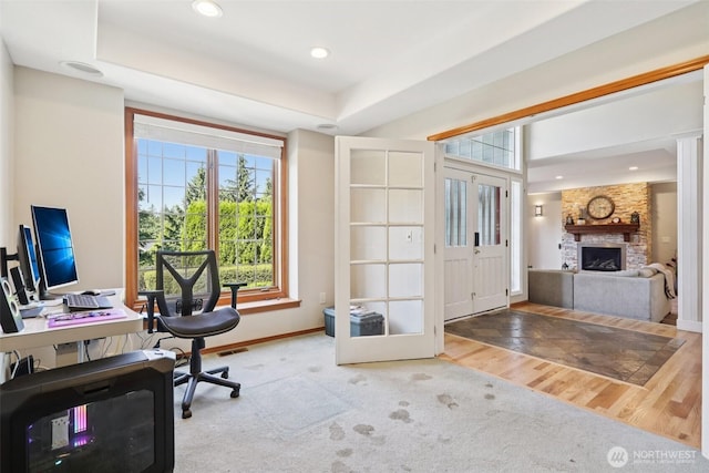18913 SE 174th Way, Renton, WA 98058 - office space featuring healthy amount of natural light, a fireplace, baseboards, and wood finished floors
