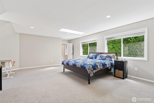 18913 SE 174th Way, Renton, WA 98058 - bedroom featuring a skylight, carpet floors, baseboards, and recessed lighting