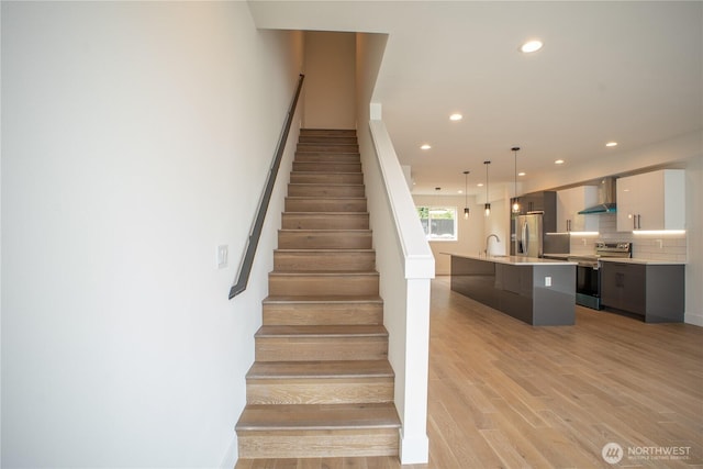 12215 Des Moines Memorial Dr S Unit A, Burien, WA 98168 - stairs featuring wood finished floors and recessed lighting