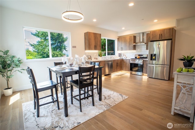 12215 Des Moines Memorial Dr S Unit A, Burien, WA 98168 - dining area featuring light wood finished floors and recessed lighting