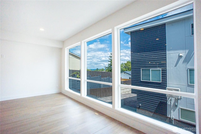 12215 Des Moines Memorial Dr S Unit A, Burien, WA 98168 - spare room featuring wood finished floors and recessed lighting