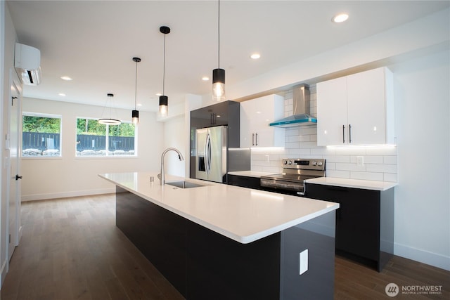 12215 Des Moines Memorial Dr S Unit A, Burien, WA 98168 - kitchen with wall chimney range hood, stainless steel appliances, modern cabinets, an AC wall unit, and light countertops