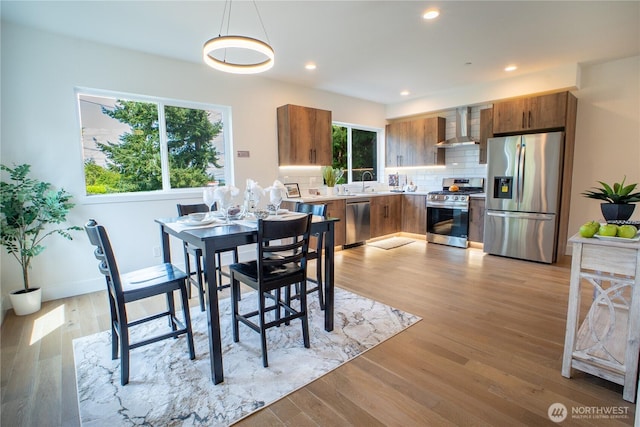 12215 Des Moines Memorial Dr S Unit A, Burien, WA 98168 - dining area featuring light wood-style floors and recessed lighting