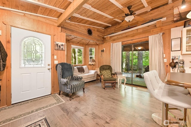 1190 Exit Rd, Maple Falls, WA 98266 - entrance foyer with wood walls, a wooden ceiling with exposed beams, wood finished floors, and a ceiling fan