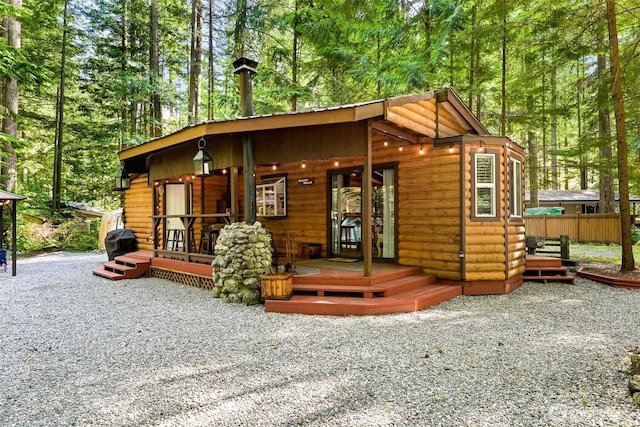 1190 Exit Rd, Maple Falls, WA 98266 - view of front facade with a porch and log veneer siding