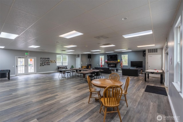 1190 Exit Rd, Maple Falls, WA 98266 - dining space featuring a paneled ceiling, wood finished floors, and french doors