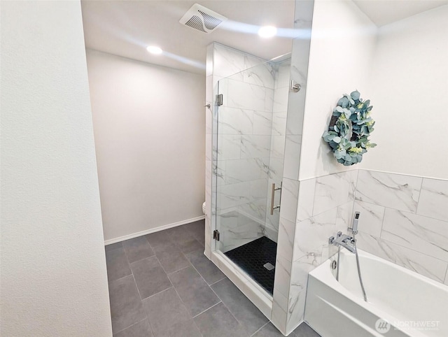3163 Walker Rd, Dupont, WA 98327 - full bathroom with a garden tub, a marble finish shower, toilet, baseboards, and recessed lighting