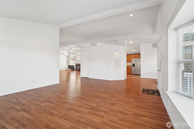 302 Oak St SW, Orting, WA 98360 - unfurnished living room featuring a ceiling fan, light wood-style floors, baseboards, and recessed lighting
