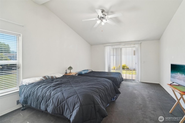 302 Oak St SW, Orting, WA 98360 - bedroom featuring access to outside, carpet flooring, vaulted ceiling, ceiling fan, and baseboards