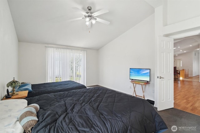302 Oak St SW, Orting, WA 98360 - carpeted bedroom with lofted ceiling and ceiling fan