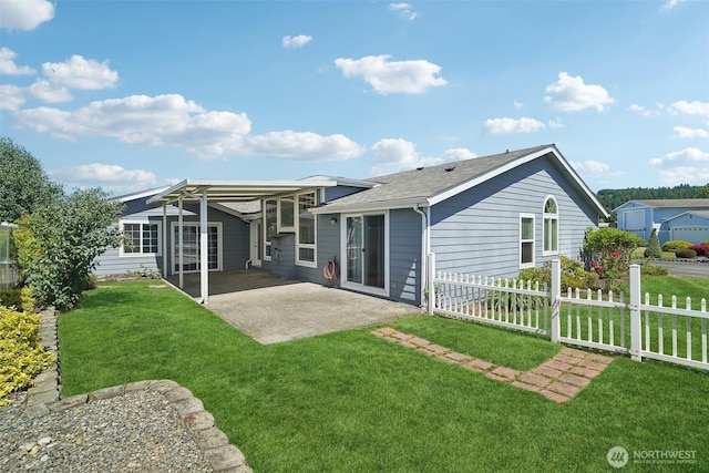 302 Oak St SW, Orting, WA 98360 - rear view of property featuring a patio and roof with shingles