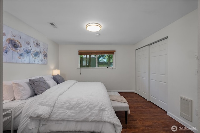5505 Windemere Dr SE, Olympia, WA 98501 - bedroom featuring wood finished floors, a closet, and baseboards
