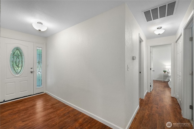 5505 Windemere Dr SE, Olympia, WA 98501 - foyer featuring wood finished floors, baseboards, and a textured ceiling