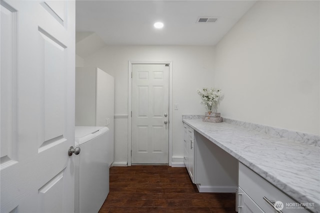 5505 Windemere Dr SE, Olympia, WA 98501 - laundry room featuring dark wood-style floors, cabinet space, recessed lighting, and washer / dryer