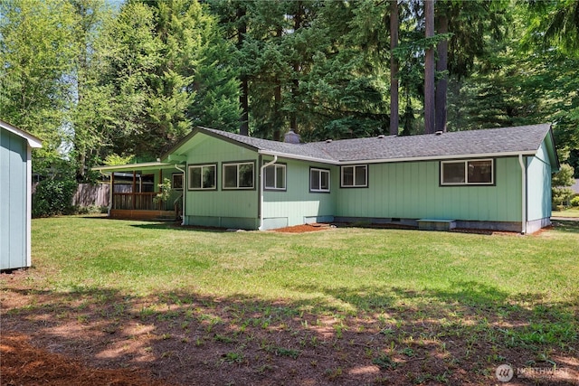 5505 Windemere Dr SE, Olympia, WA 98501 - rear view of property featuring a lawn and roof with shingles