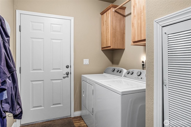 200 Bridle Way Unit 249, Yakima, WA 98901 - laundry room featuring washer and dryer, cabinet space, dark wood-type flooring, and a heating unit