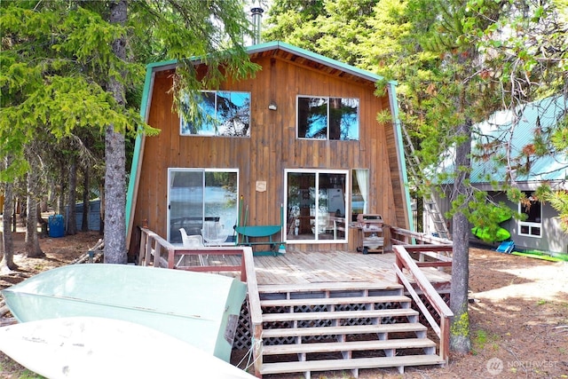 90B Moore Dr, Riverside, WA 98849 - back of property with a deck and outdoor dining space