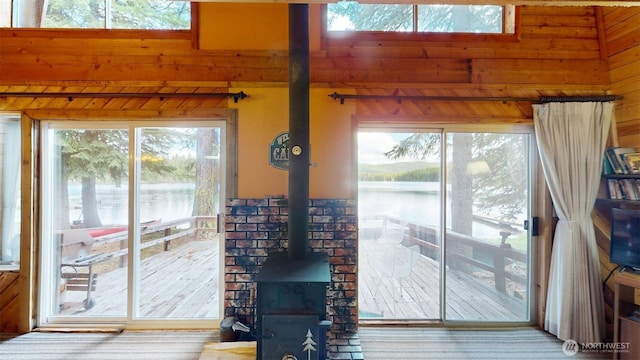 90B Moore Dr, Riverside, WA 98849 - entryway featuring wooden walls and a wood stove