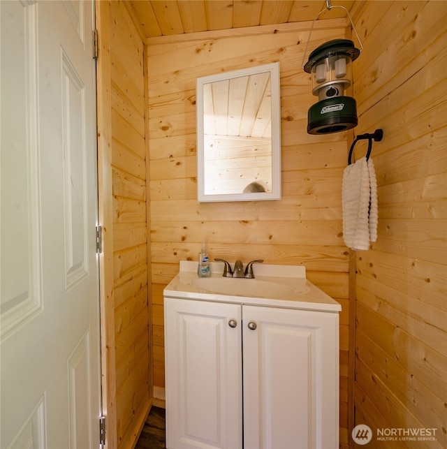 64 Eliza Is, Bellingham, WA 98226 - bathroom with vanity and wooden walls