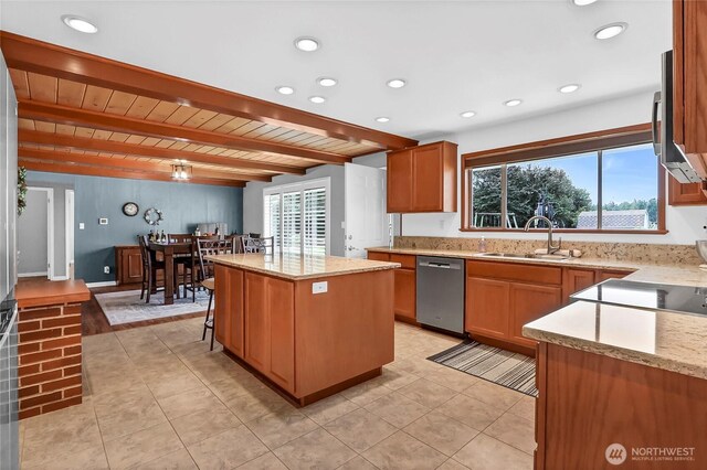8402 57th Ave E, Puyallup, WA 98371 - kitchen with stainless steel dishwasher, a sink, a kitchen island, healthy amount of natural light, and recessed lighting