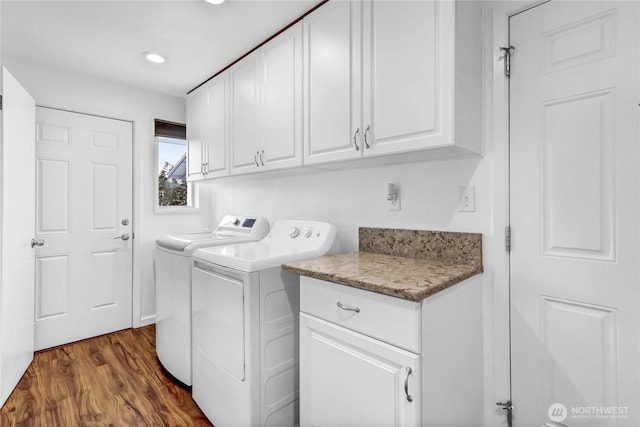 8402 57th Ave E, Puyallup, WA 98371 - washroom featuring cabinet space, independent washer and dryer, dark wood-style floors, and recessed lighting