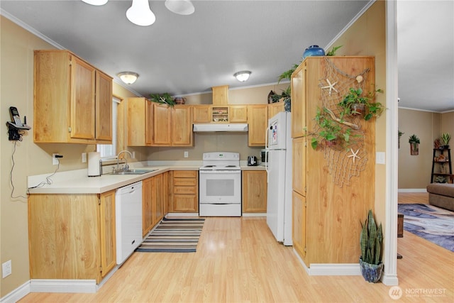 140 Leland Rd, Longview, WA 98632 - kitchen with white appliances, a sink, light wood-style floors, under cabinet range hood, and crown molding