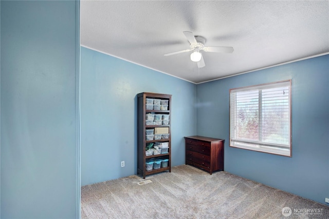 140 Leland Rd, Longview, WA 98632 - unfurnished room with ceiling fan, carpet floors, and a textured ceiling