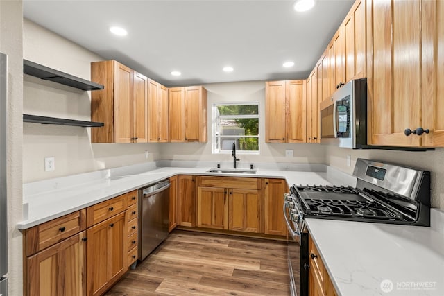 25921 Clear Creek Rd, Darrington, WA 98241 - kitchen with stainless steel appliances, a sink, open shelves, recessed lighting, and light wood finished floors