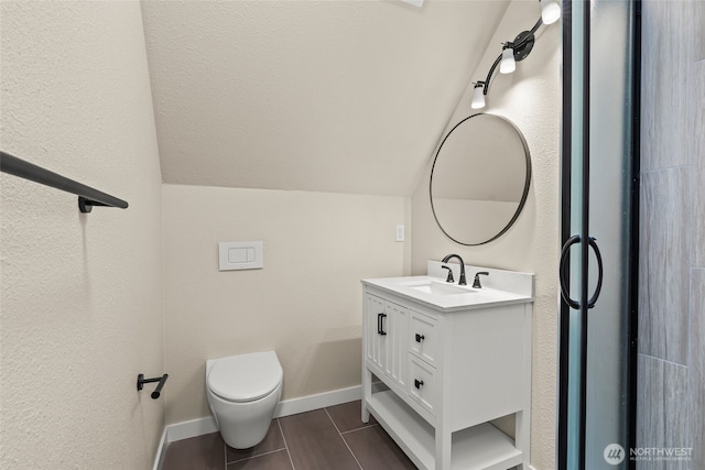 25921 Clear Creek Rd, Darrington, WA 98241 - bathroom with vaulted ceiling, vanity, toilet, and baseboards