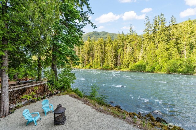 25921 Clear Creek Rd, Darrington, WA 98241 - water view with a heavily wooded area