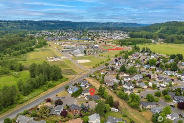 502 NW Alexander Ct, Orting, WA 98360 - aerial view of residential area featuring a forest