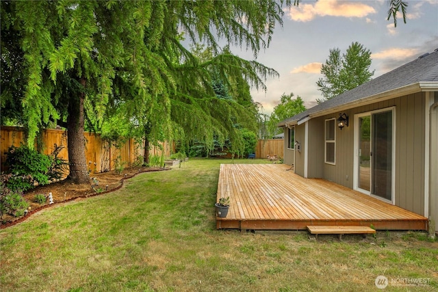 502 NW Alexander Ct, Orting, WA 98360 - yard at dusk with a deck