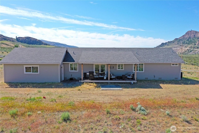 212 Hubbard Rd, Riverside, WA 98849 - back of property featuring a mountain view and outdoor lounge area