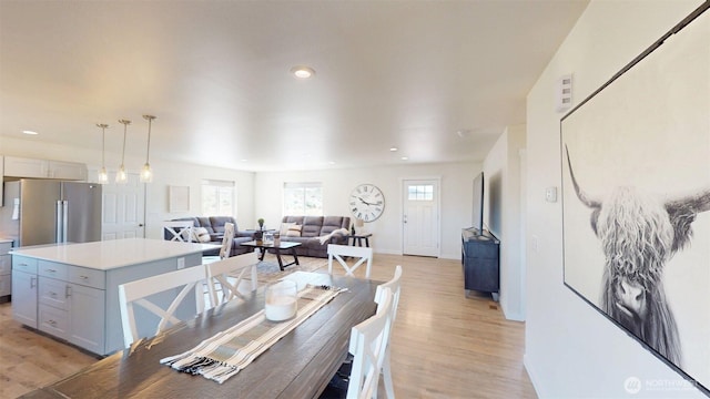 212 Hubbard Rd, Riverside, WA 98849 - dining room with light wood finished floors, baseboards, and recessed lighting